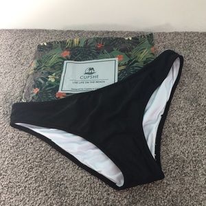 One pair of Cupshe black bathing suit bottoms.